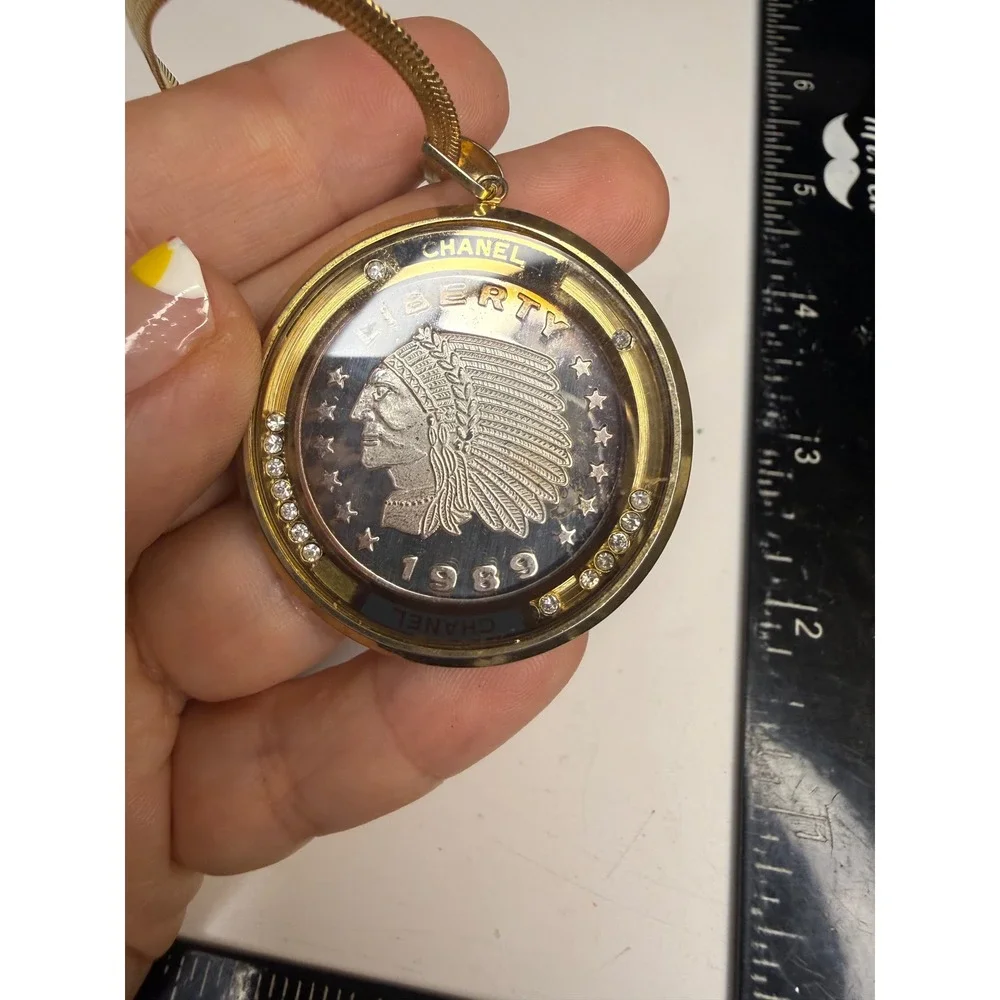 Chanel 1989 Liberty Indian Head Coin Pendant Necklace Gold Tone Rhinestone 99.9